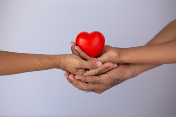 family holding  heart  red symbol valentine romantic  emotion happy, concept: virus covid 19...