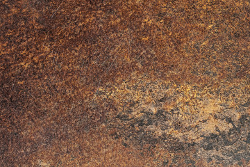 Natural beige stone slab texture aged by time with scuffs and moss in macro shot
