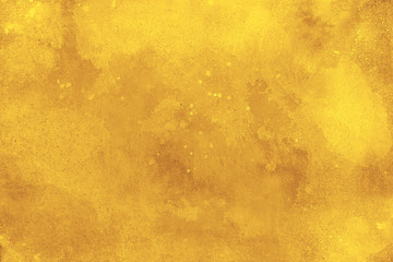 Colorful background texture concrete in gold color.  Copy space.