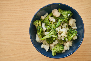 Boiled vegetables. Cauliflower in a plate. Steamed vegetables. Healthy eating