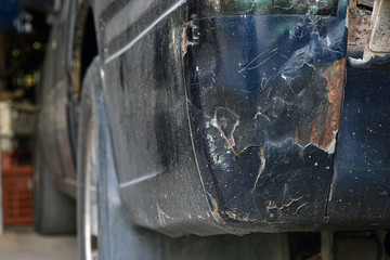 The color of the car is peeling off due to severe collisions.