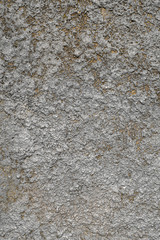 Natural natural texture of concrete with gray and gold stucco in macro shot