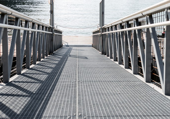 Fototapeta premium Looking down on a metal ramp to the Danube.