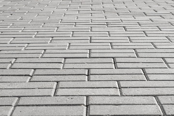 Natural natural texture of stone paving slabs in a macro shot in sunny weather