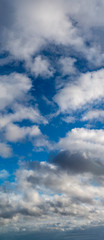 Obraz premium Fantastic clouds against blue sky, panorama