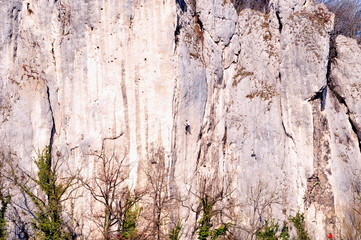 Rock at danube river with climber
