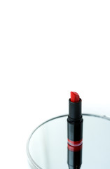 red lipstick on a white background