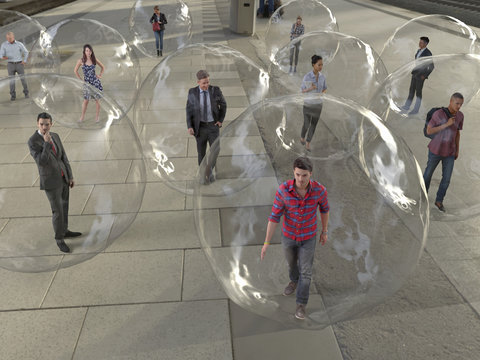 group of people in protective balls