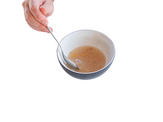 Traditional Turkish dessert ashure or Noah's Pudding isolated on white.