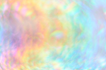 Color neon gradient. abstract blurred background. silver paper with a holographic effect. close up...