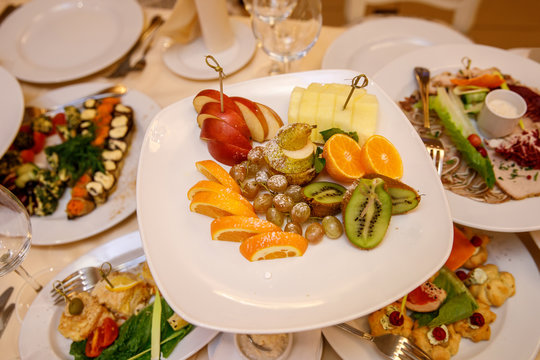 Fruit and other snacks on the banquet table.