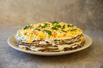 Cake from liver pancakes and vegetables.