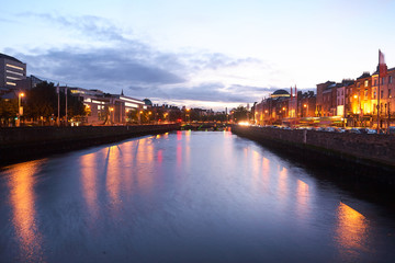 Naklejka na ściany i meble A view along the quays in Dublin City, Ireland