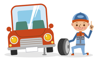 タイヤ交換をする自動車整備士とジャッキアップされた車