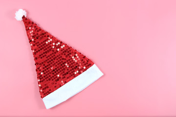 Santa hat isolated on pink background.