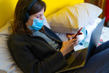 A white girl is working from home during Coronavirus or Covid-19 quarantine, coronavirus covid 19...