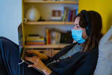 A white girl is working from home during Coronavirus or Covid-19 quarantine, coronavirus covid 19...