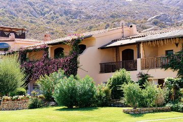 Windows and balconies of residential house complex in Porto Cervo