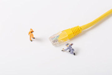 Network cable and villain on white background