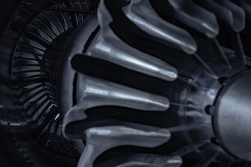Turbine Engine. Aviation Technologies. Aircraft jet engine detail during maintenance. Blue toned.