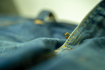 Blue jeans zipper on the white background