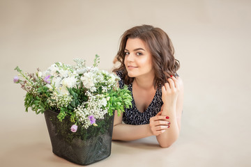 The girl suffers from pollen allergy during flowering. Young woman got nose allergy. Woman is...