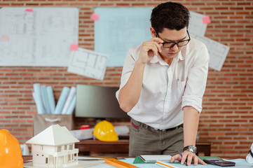 Male architect are using ideas for designing engineering or architecture to come out completely....