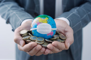 world globe with mask and euro coins