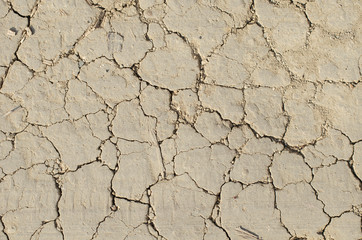 Desert. Aerial view of beautiful cracks in  ground. texture, deep crack. Copy space. Place for text. Selective focus image.Effects of heat and drought. cracked desert. Copy space. Place for text. 