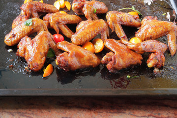  chicken wings baked in the oven with sospetsii, herbs and soy sauce.