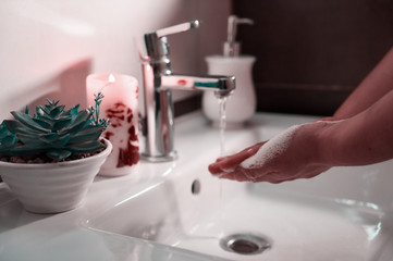 Corona Virus pandemic protection by washing hands frequently.