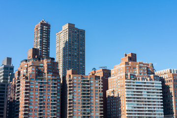 Fototapeta na wymiar Upper East Side New York City Skyline with a Clear Blue Sky