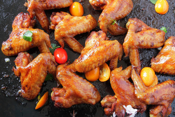  chicken wings baked in the oven with sospetsii, herbs and soy sauce.