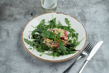 Prawns, avocado and arugula salad with balsamic vinegar and a glass of good white wine