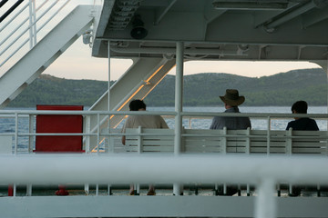People sitting on ferry, Croatia.