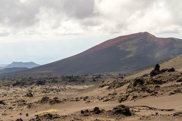 Lifeless volcanic landscape in the overcast weather. Kamchatka Peninsula, Russia