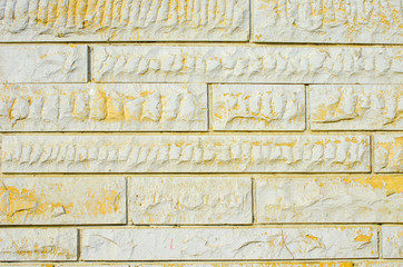 Light yellow background. Wall of light decorative brick close up. Copy space. Place for text....