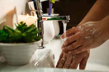 Corona Virus pandemic protection by washing hands frequently.