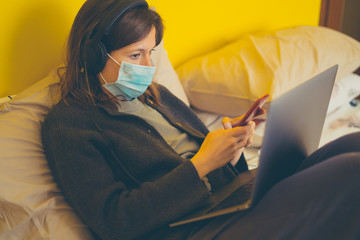A white girl is working from home during Coronavirus or Covid-19 quarantine, coronavirus covid 19...