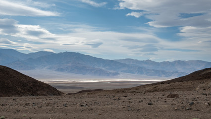 Fototapeta na wymiar cars in the middle of the death valley desert, california