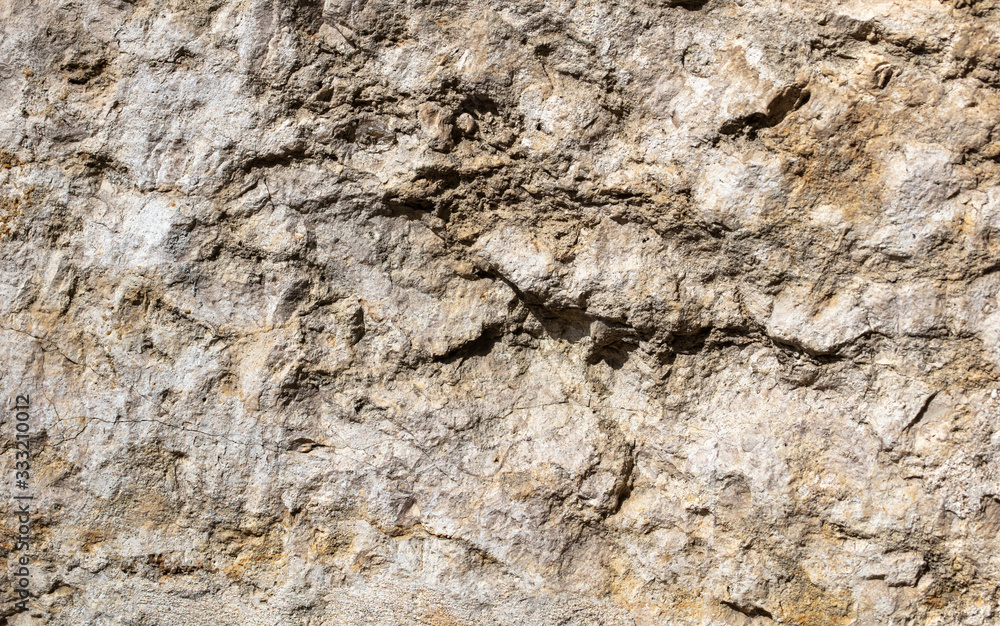 Wall mural stones on the rock as an abstract background