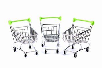 An empty grocery cart from a supermarket. There is a shortage of products in the store due to the...