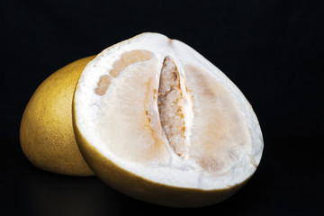Pomelo on a black background