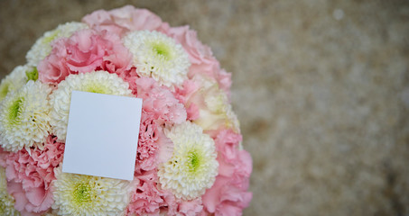 Pink carnation and white chrysanthemum bouquet 