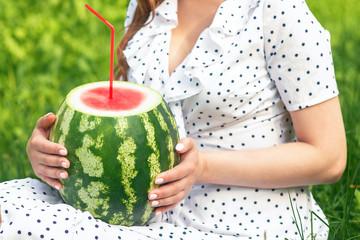 Watermelon with cocktail straw.