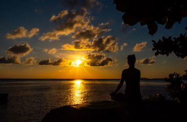 Naklejka na ściany i meble Serenity and yoga practicing in twilight sunset time, meditation