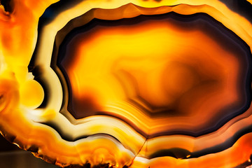 yellow agate slice, black background