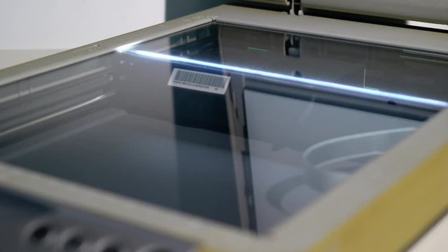 Scanner in office, copying documents.