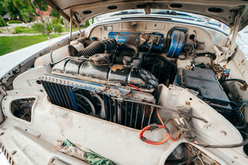 Open hood on old russian retro car in detail. Backgrounds
