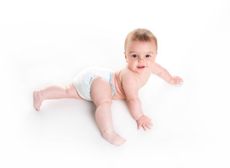 Sweet little girl on the floor of studio white background
